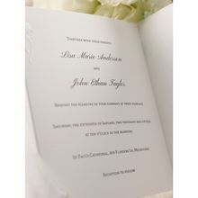 Raised printing on trifold black and white wedding invitation